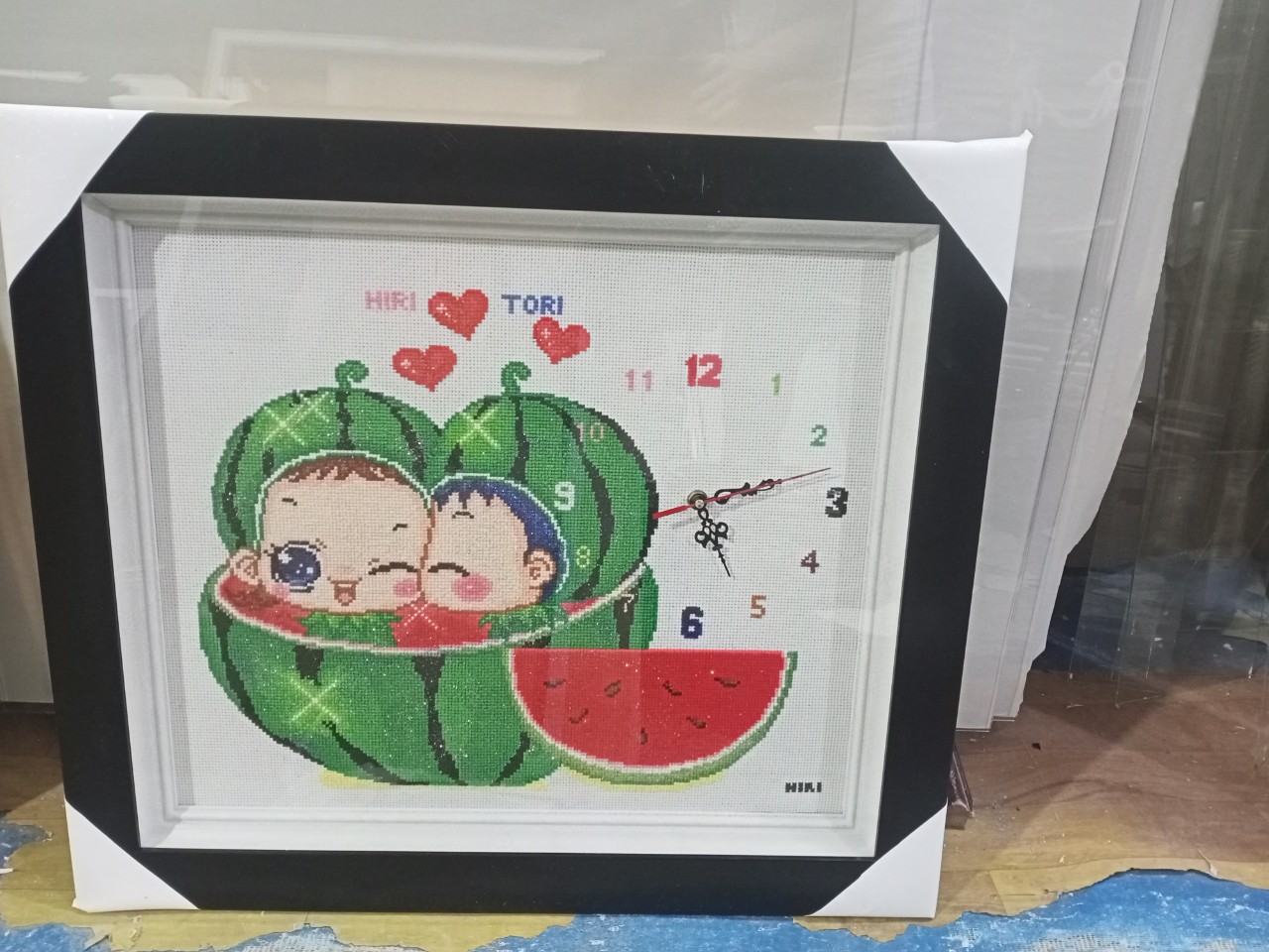 dong-khung-tranh-theu-chu-thap-dong-ho